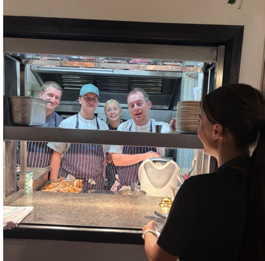The kitchen team at the pass at The Yew Tree